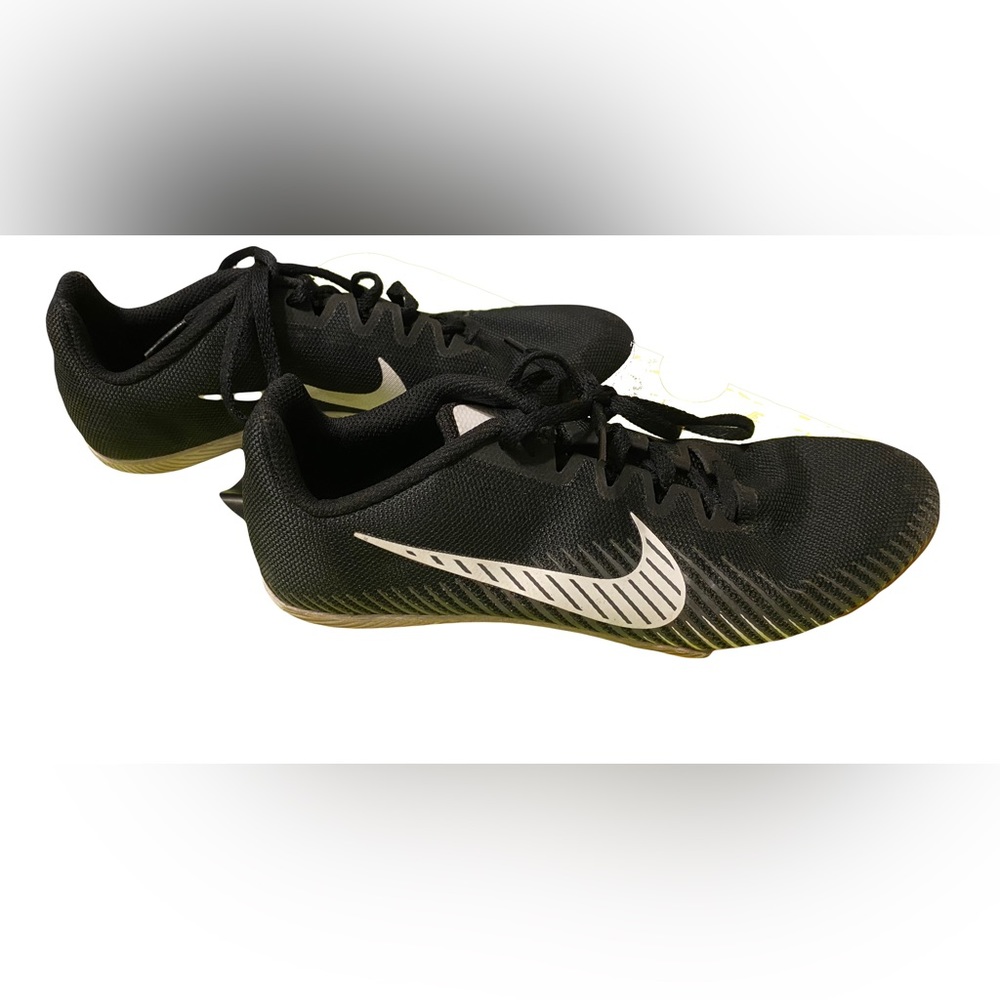 Black and white Size 7 women’s NIKE track cleats